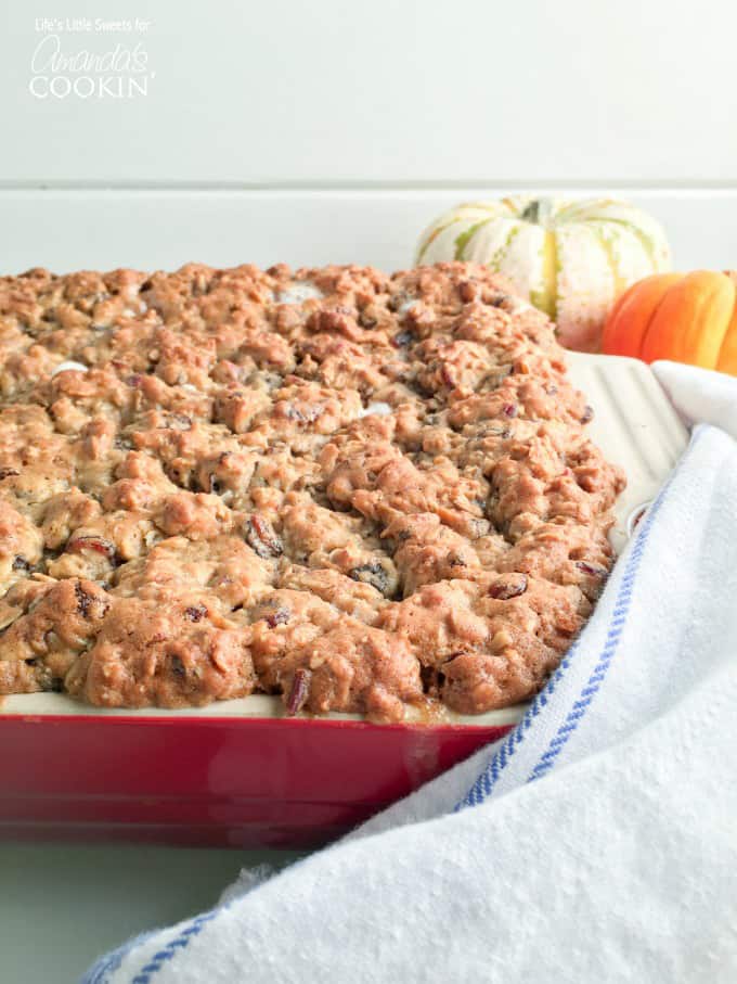A casserole dish filled with baked oatmeal cookie sweet potato casserole.