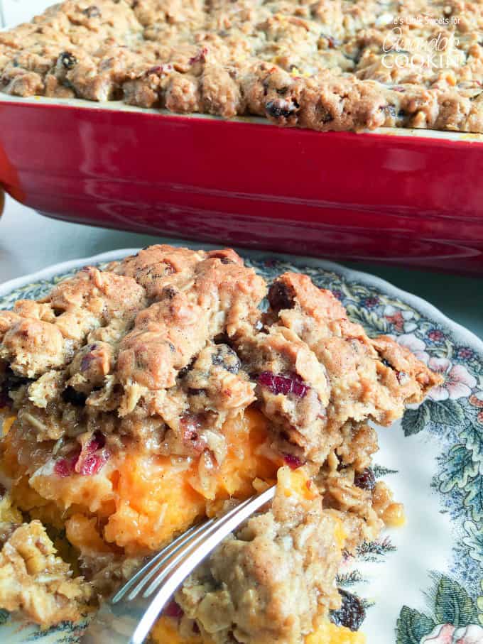 A close up of oatmeal cookie sweet potato casserole on a plate.