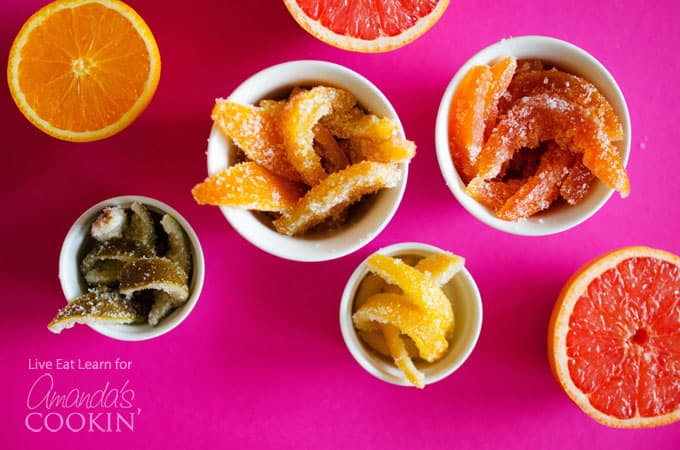 Bowls of orange, lemon, grapefruit and lime candied citrus peels.