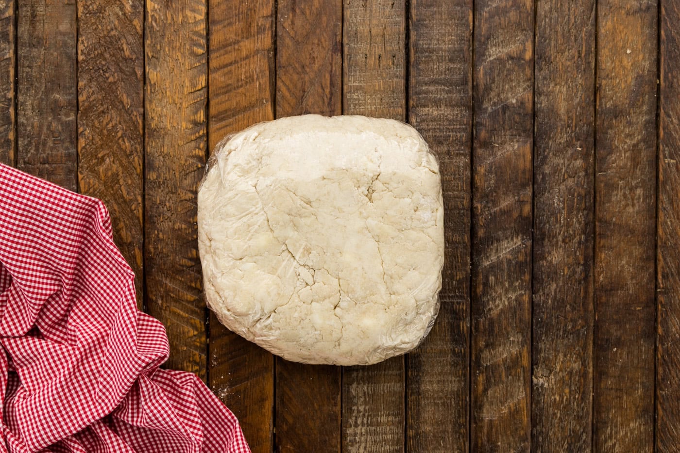 pie crust wrapped in plastic wrap