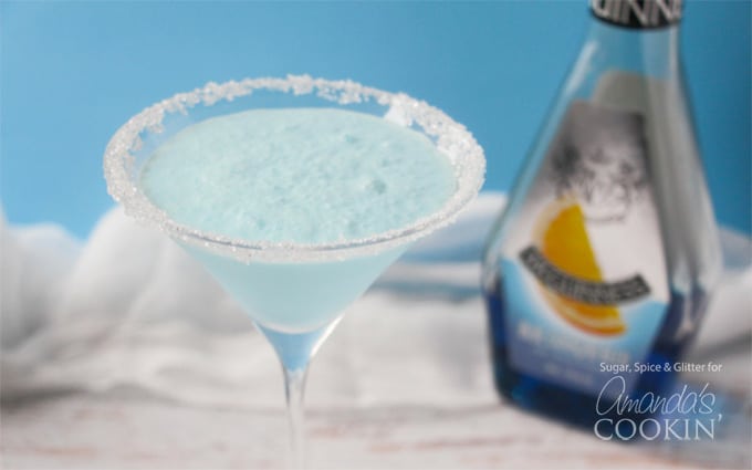 A close up of a blended frostbite martini in a clear martini glass.
