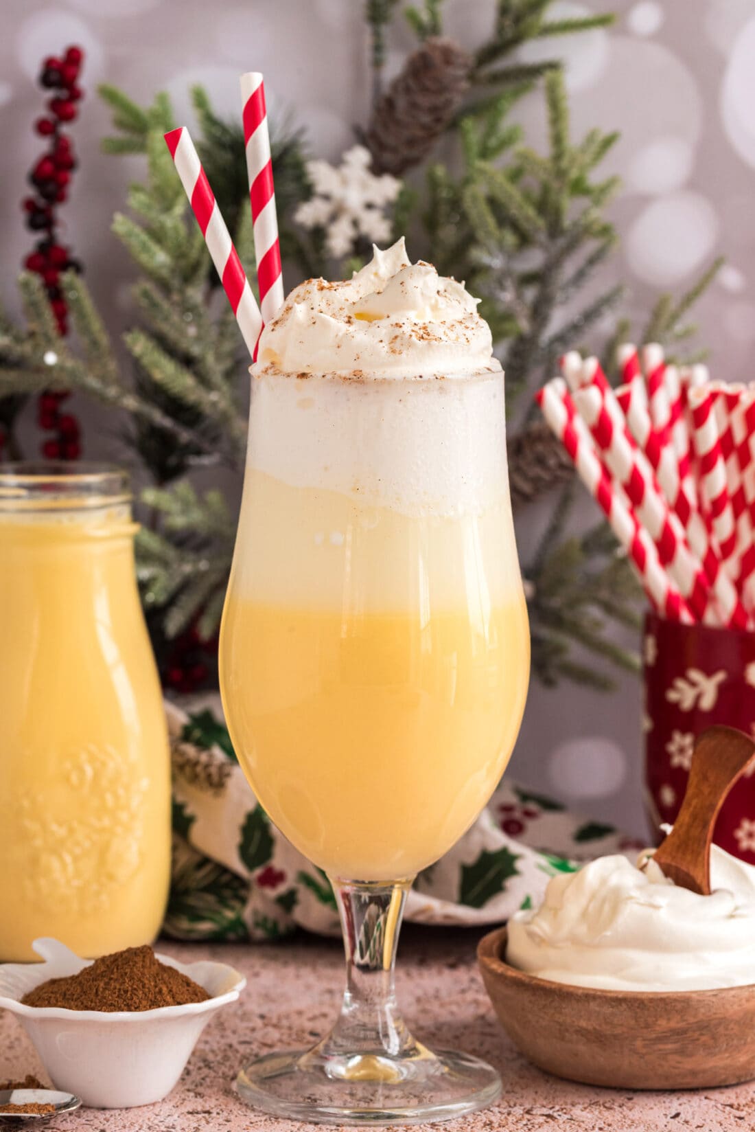 Eggnog Float topped with whipped cream and a straw