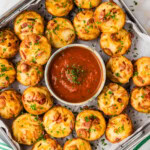 try of Pepperoni Pizza Puffs with a bowl of marinara