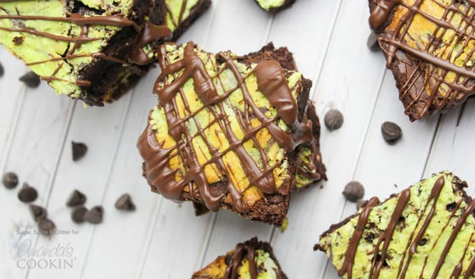 Overhead picture of a marbled mint cheesecake brownie square.