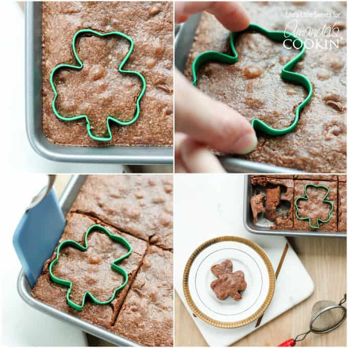 cutting out a brownie with shamrock cookie cutter