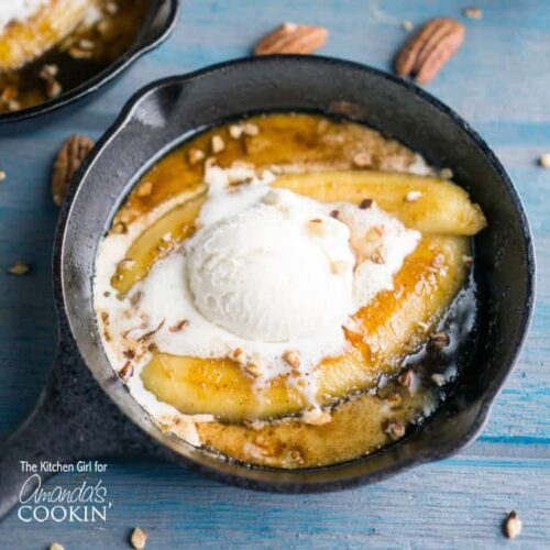 Single serve banana foster topped with vanilla ice cream in a 5" skillet.