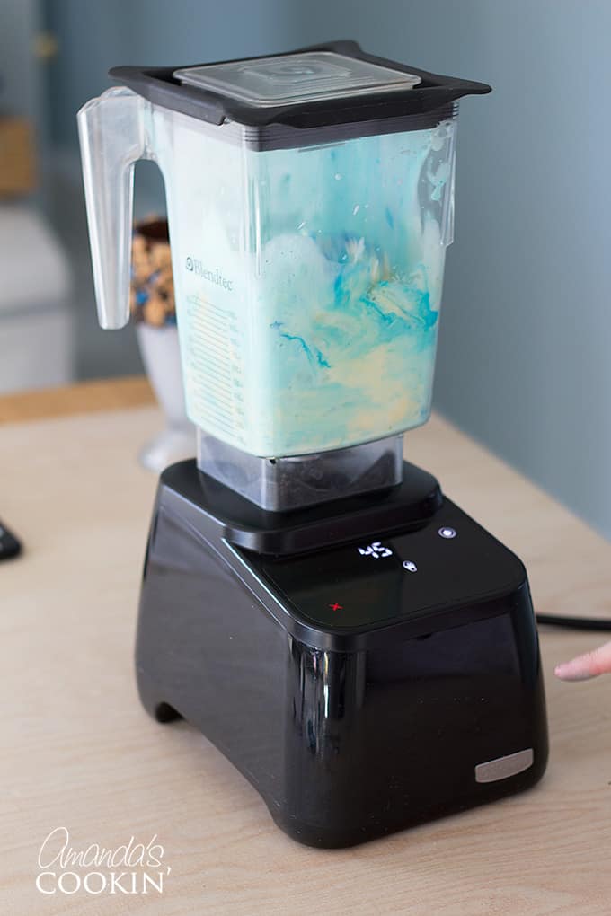 Then add your sky blue gel food coloring to the blender as well. It's best to add a small amount at first, and if you are unhappy with the color outcome, add a little more.