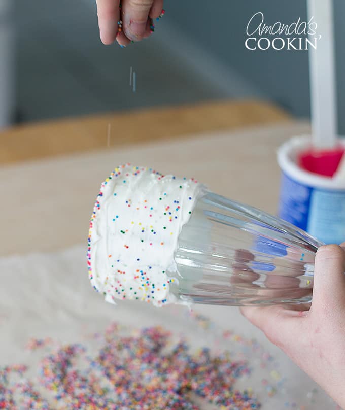 Sprinkling on multi-colored sprinkles