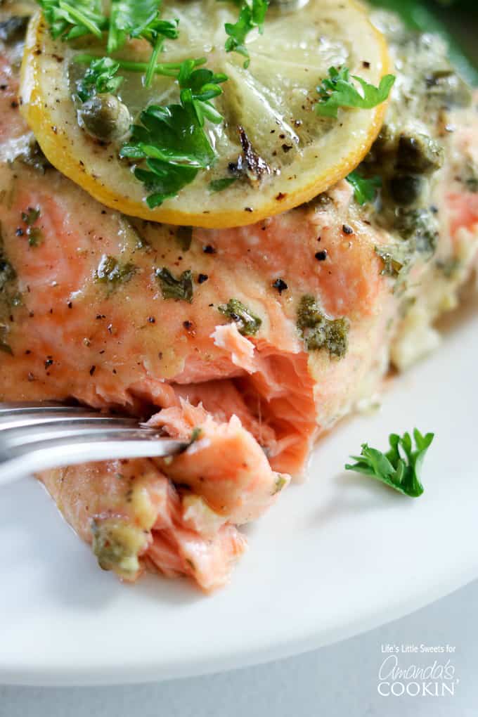 Flaky and satisfying dijon lemon caper salmon recipe.