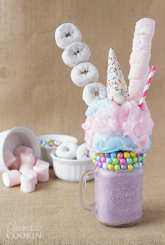 purple milkshake with donuts and marshmallows