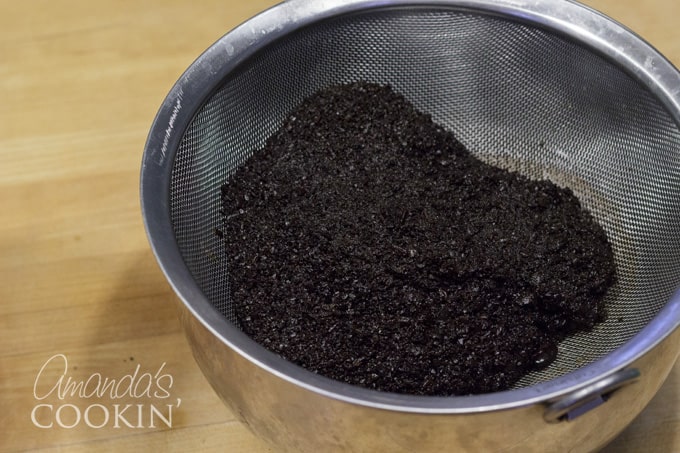 Discard or compost the coffee grounds.