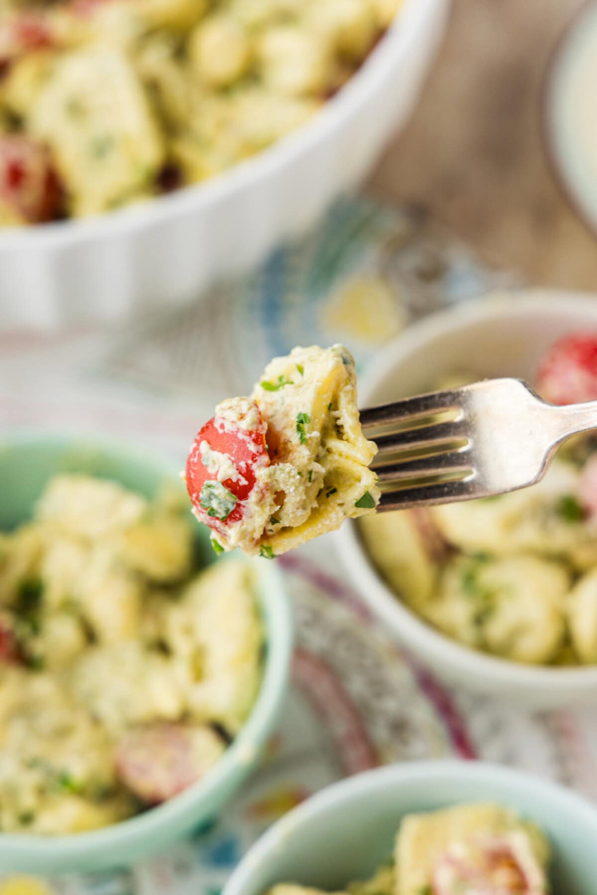 fork mof Tortellini Pesto Pasta Salad
