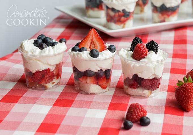 snack cups with strawberries, blueberries, whipped topping and angel food cake