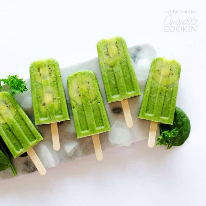 green popsicles on a plate of ice