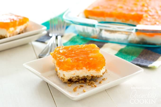 Indulge your guests with this Mandarin Orange Pretzel Salad dessert!