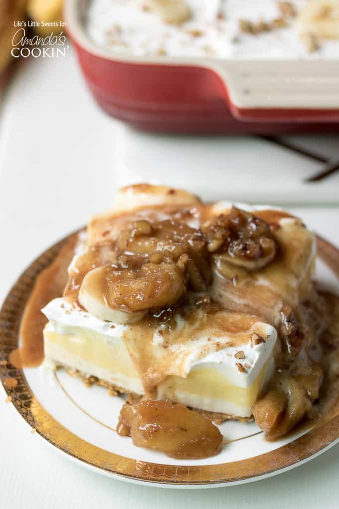 layered banana dessert with caramel banana fosters sauce