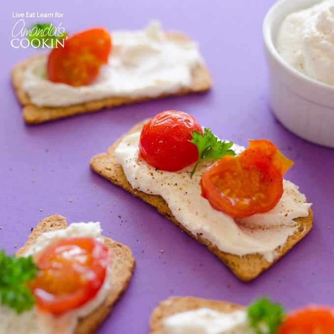 feta on crackers with cherry tomatoes