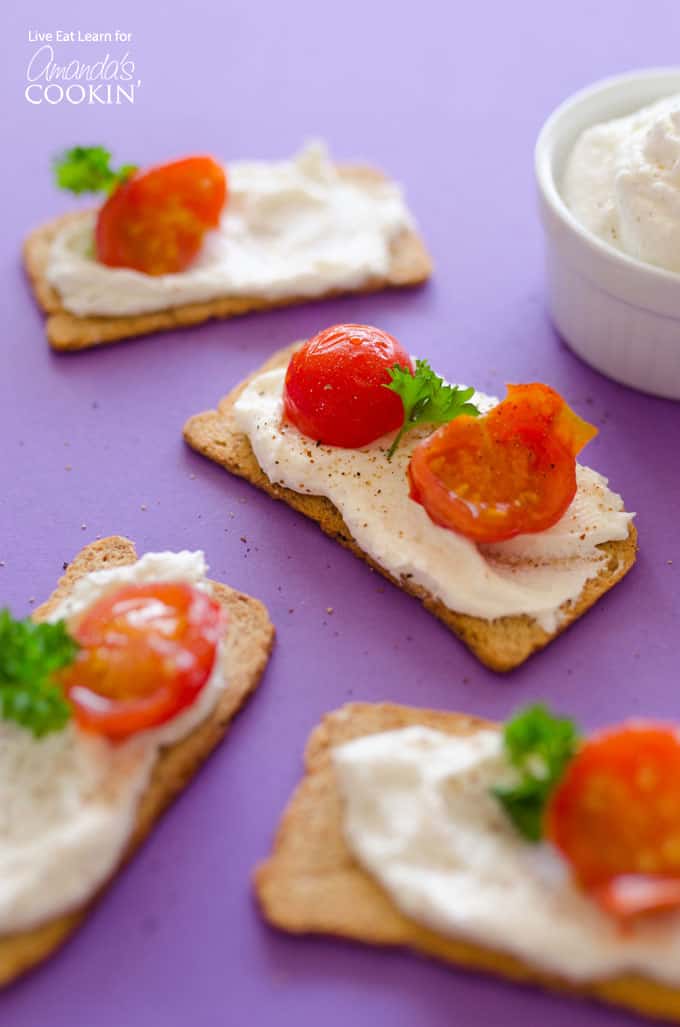 Ricotta Whipped Feta on crackers with tomatoes