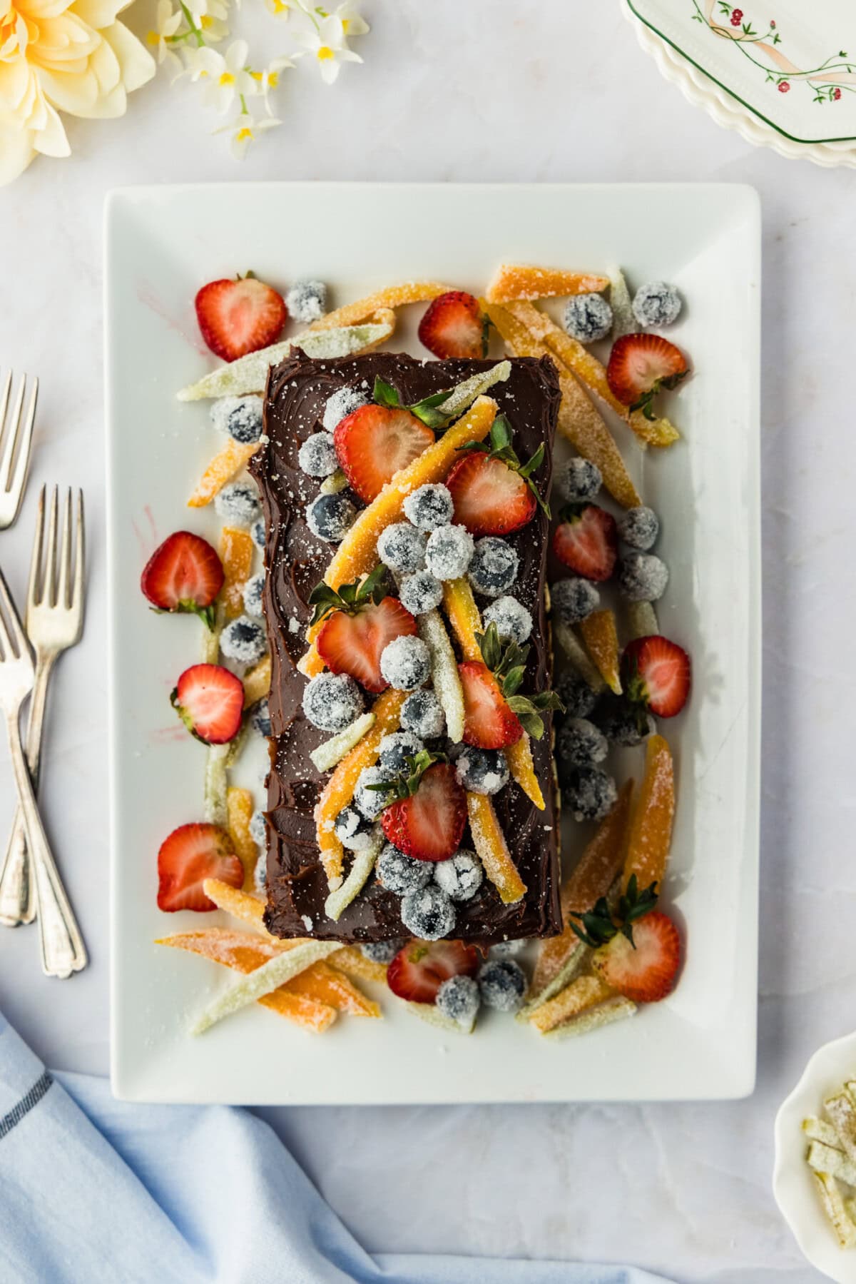 overhead view of cassata cake with fruit topping