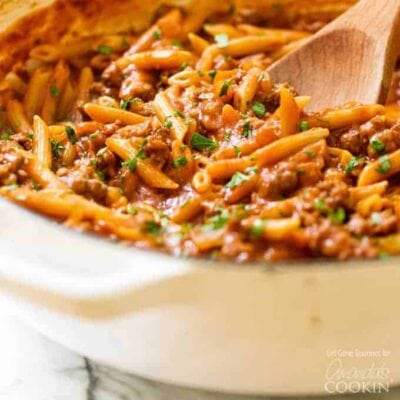 pan of sloppy joe pasta with a wooden spoon