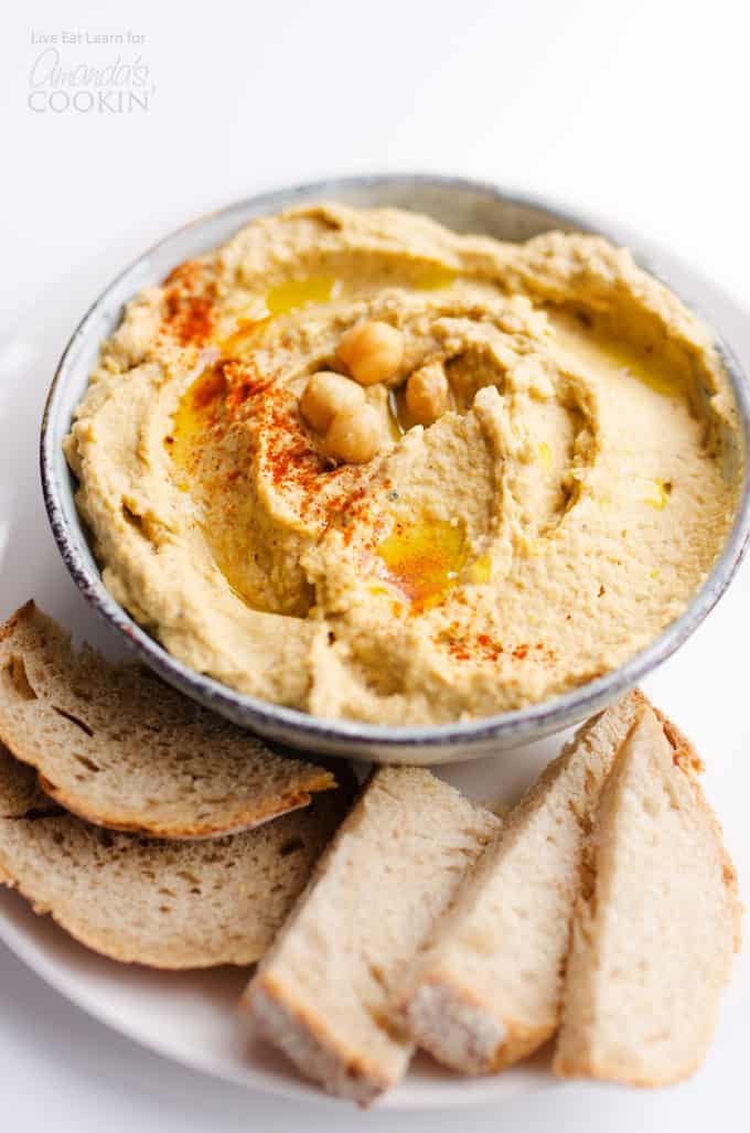 baba ganoush hummus in bowl with bread