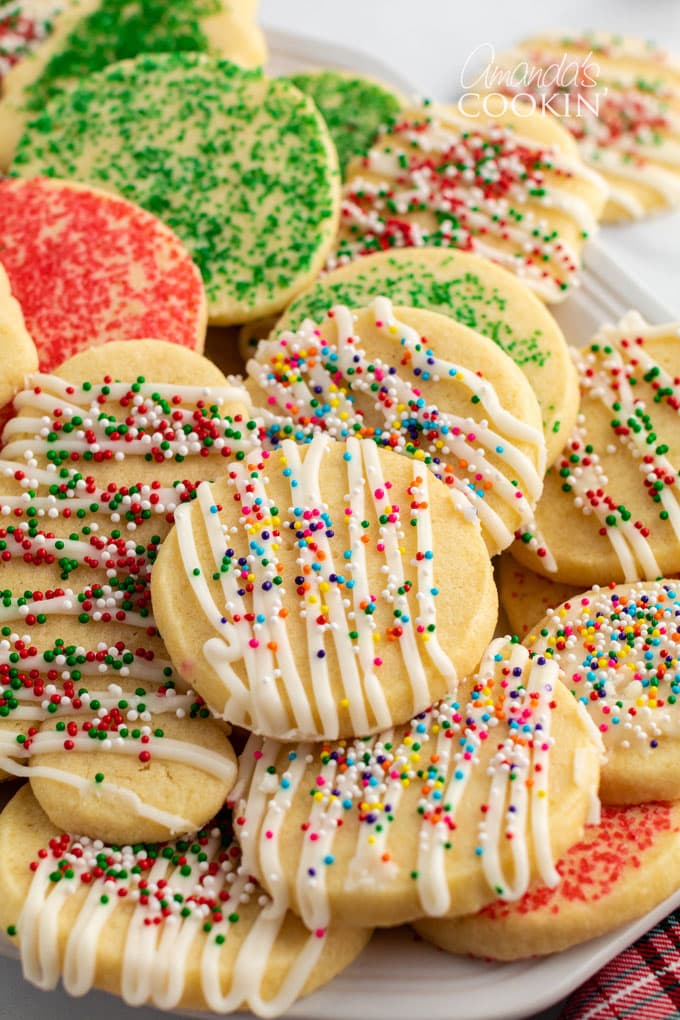 close up of a plate full of decorated sugar cookies