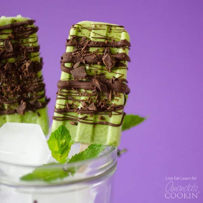 chocolate covered popsicle in a glass of ice