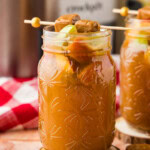 close up of Crockpot Caramel Apple Cider in a jar