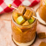 overhead angle of a glass of Crockpot Caramel Apple Cider