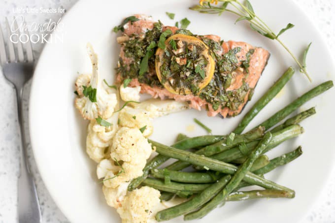 Sheet pan salmon dinner on a plate