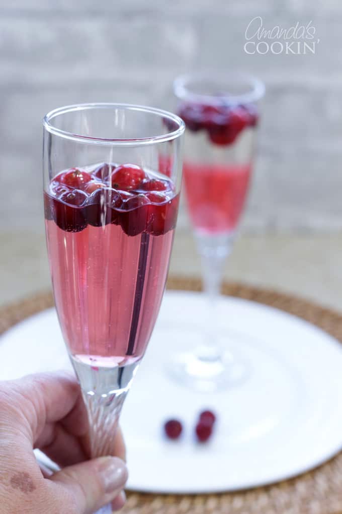 holding prosecco punch