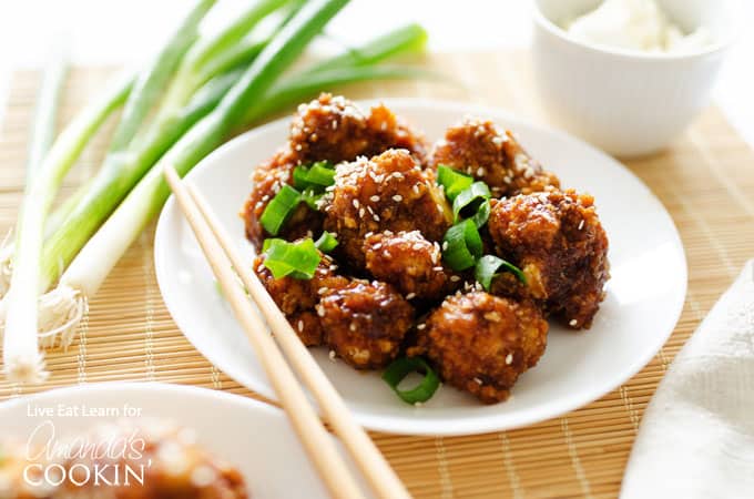 sticky garlic cauliflower on plate with chopsticks