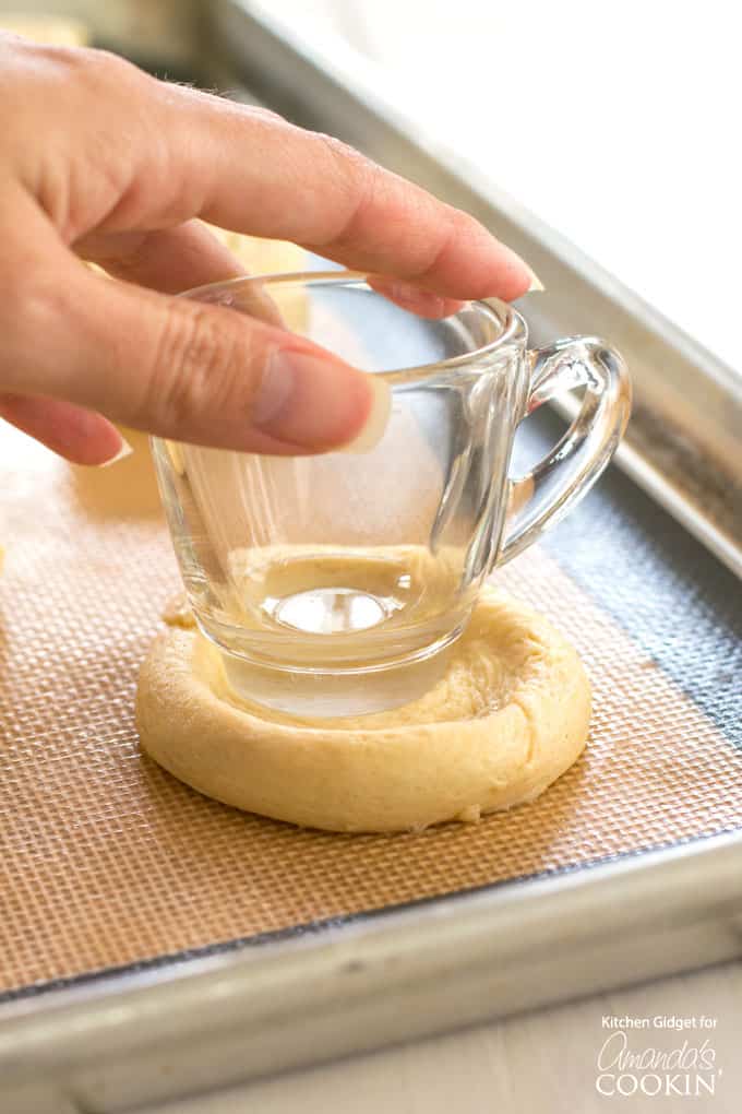 pressing down the dough for the filling