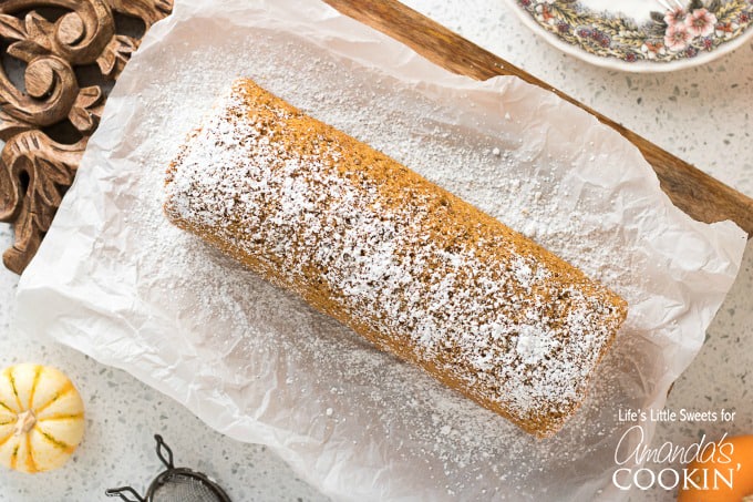 Pumpkin roll recipe with dusted powdered sugar