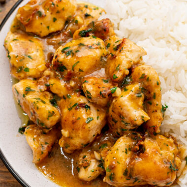 garlic chicken on plate with rice