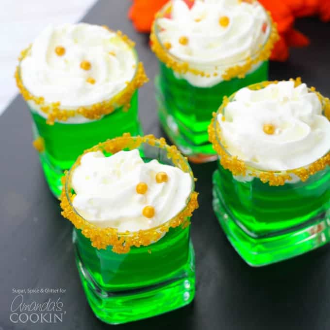 green Jello shots with Whipped cream