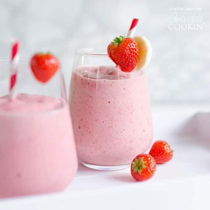 A close up of a strawberry banana smoothie