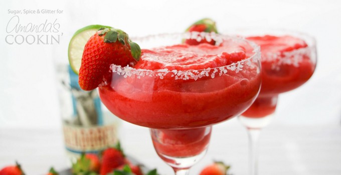 Strawberry Margarita with strawberry and lime garnish