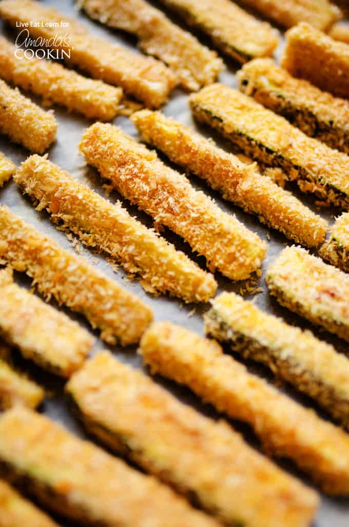 Crispy baked zucchini fries on pan