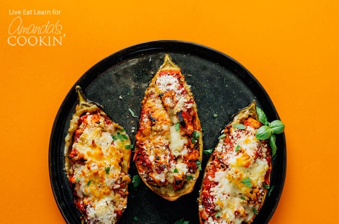 cooked eggplant on a black plate