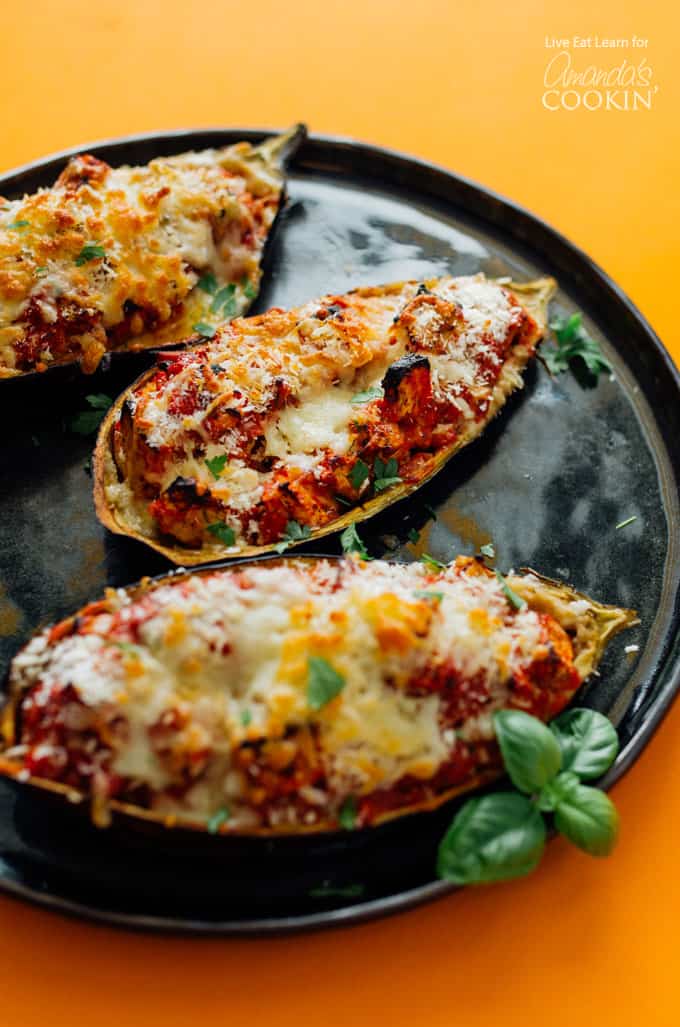 cooked eggplant on a black plate