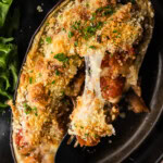 cheese pull from panko topped stuffed baked eggplant parmesan