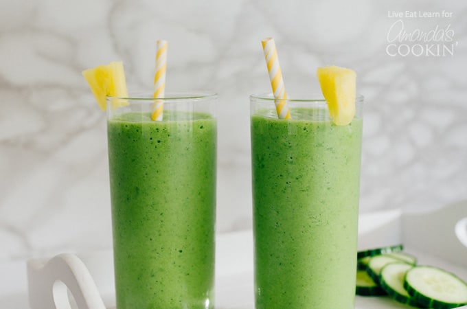 Cucumber tropical smoothies with pineapple wedge