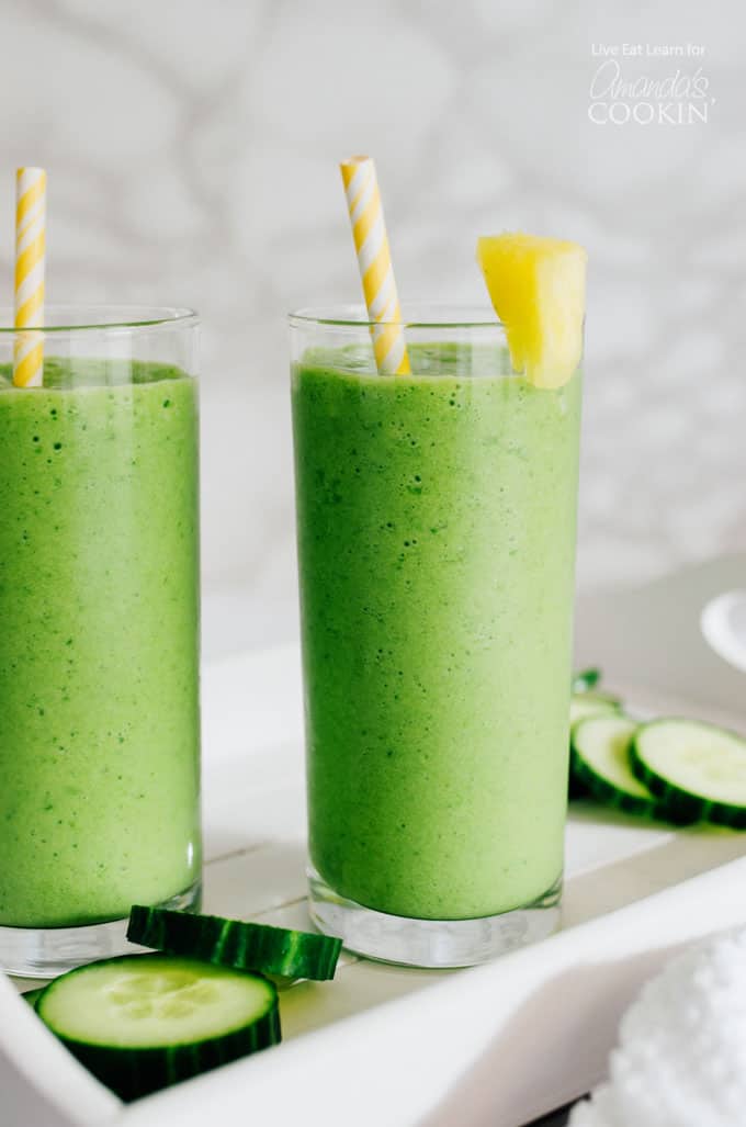 Cucumber Tropical Smoothies in glass with pineapple garnish