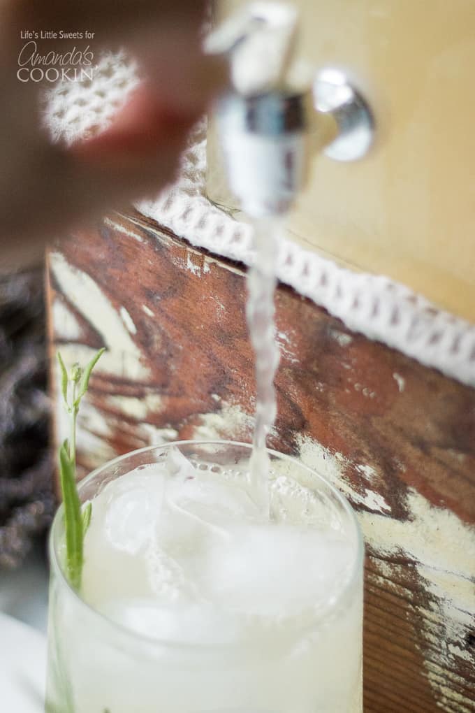 pouring lemonade into glass