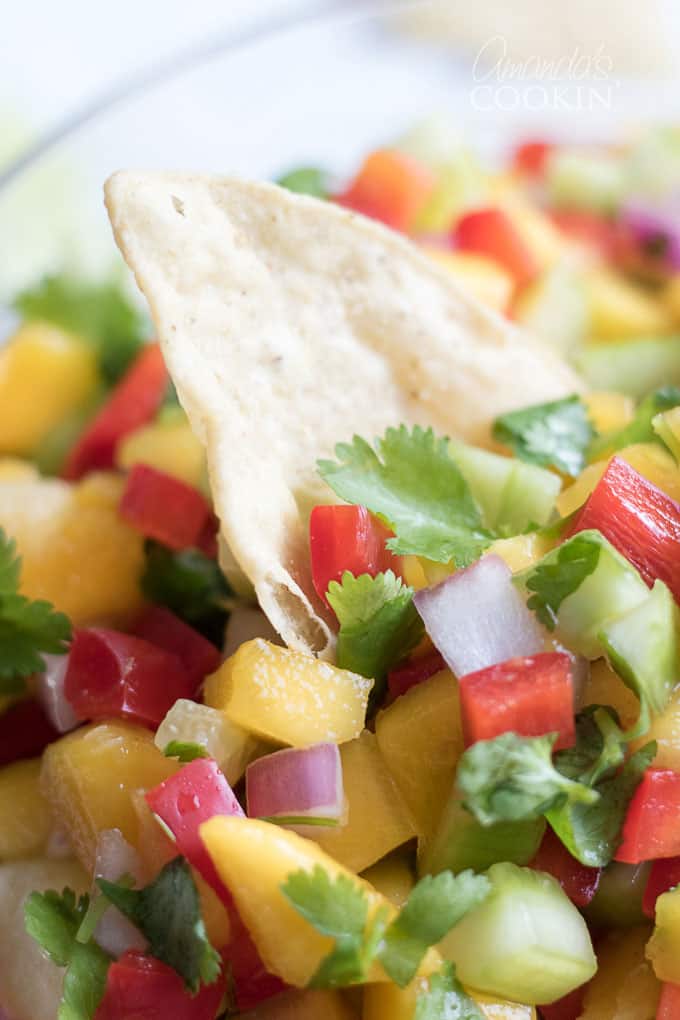 Close up of mango salsa and chips