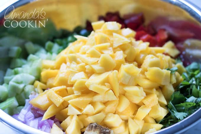 Combine all fresh ingredients for this beautiful mango salsa