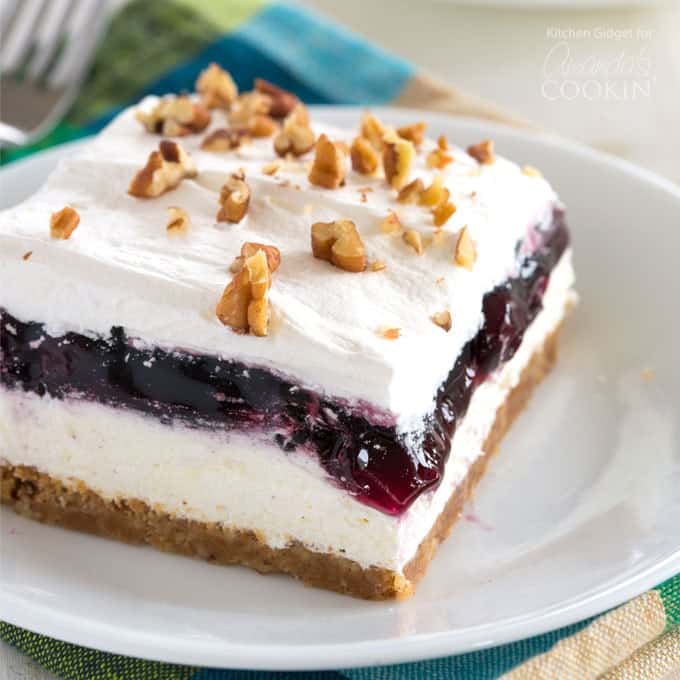 slice of blueberry and cream cheese layered dessert