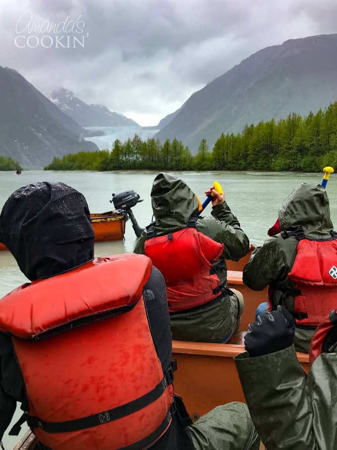 people in canoe in alaska