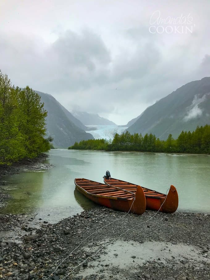 canoes on shore with Davidson Glacier in the background